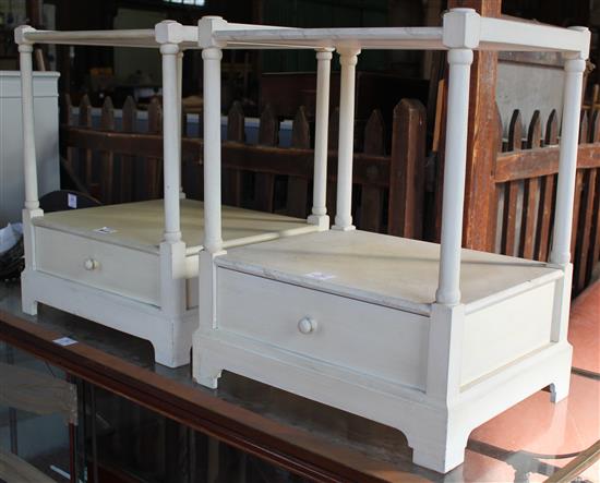 Pair of white painted two tier bedside tables